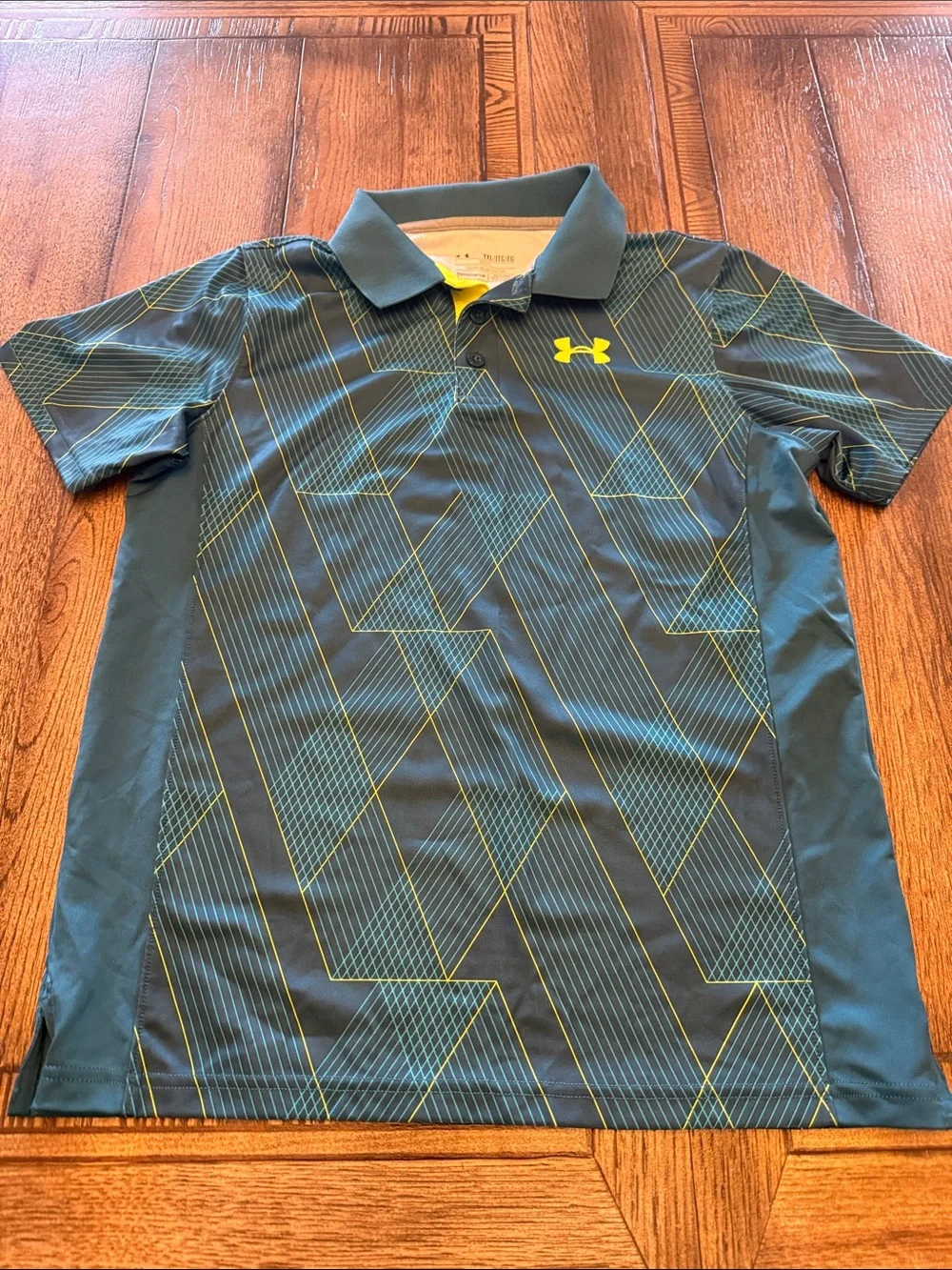 Under Armour Boys Black Polo with Yellow Logo and Teal Geometric Lines
